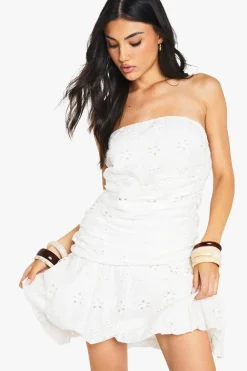 Ruched Bandeau Dropped Waist Broiderie Mini Dress | Nasty Gal
